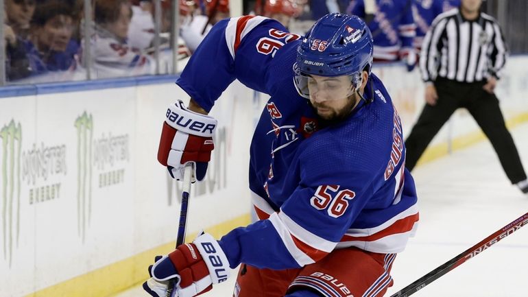 Erik Gustafsson #56 of the Rangers skates during the first period...