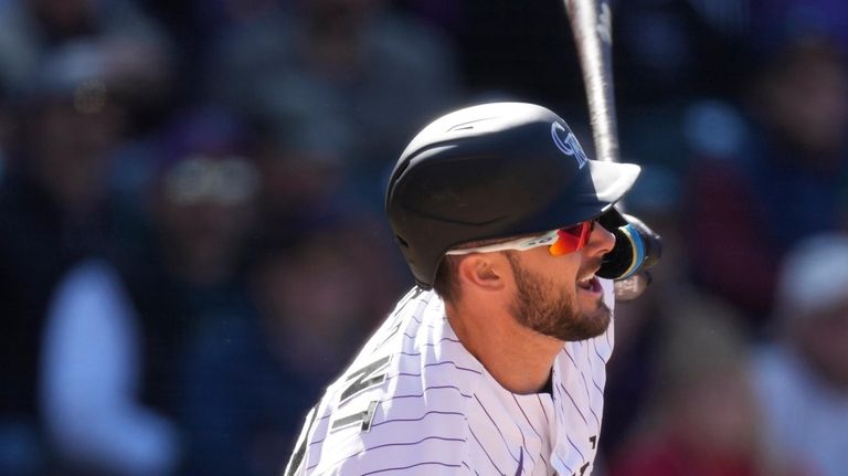 Freeland leads Rockies to 1-0 win over Nationals in home opener