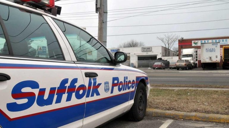 A police cruiser outside of the Suffolk County Third Precinct...