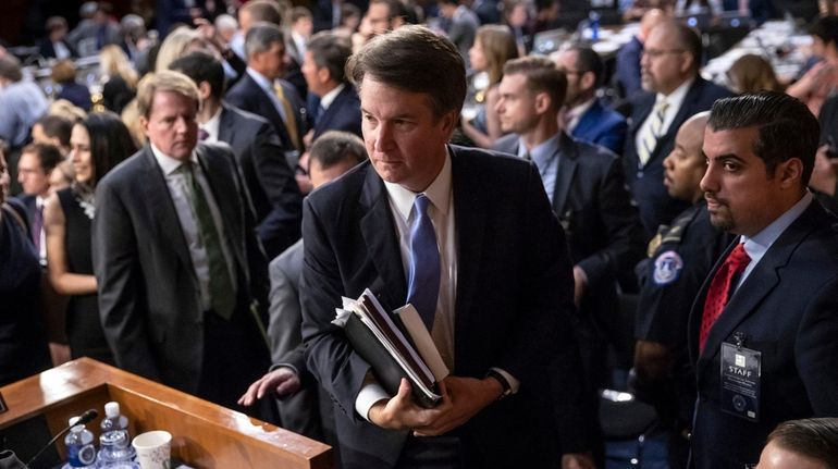 Brett Kavanaugh, President Donald Trump's Supreme Court nominee, leaves the...