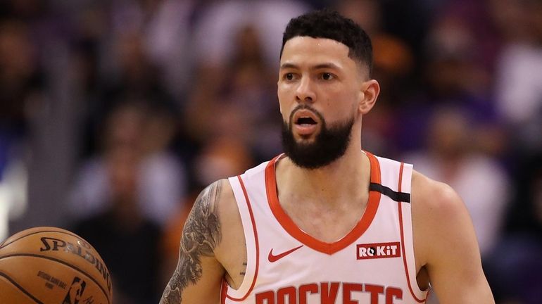 Austin Rivers handles the ball at Talking Stick Resort Arena on...