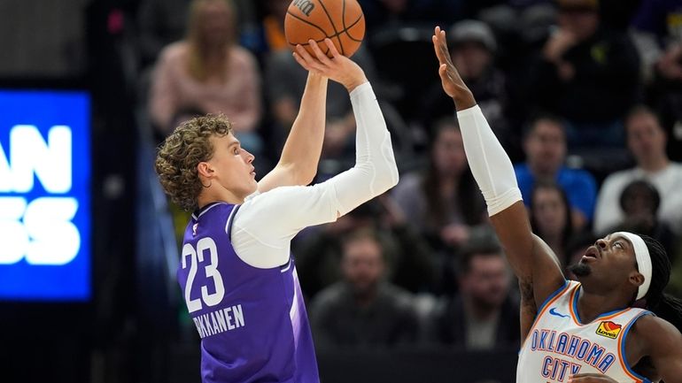 Utah Jazz forward Lauri Markkanen (23) shoots as Oklahoma City...