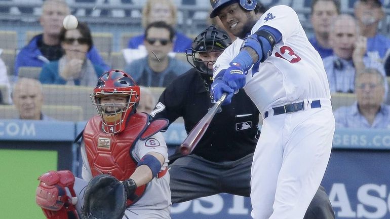 Los Angeles Dodgers shortstop Hanley Ramirez hits a single during...