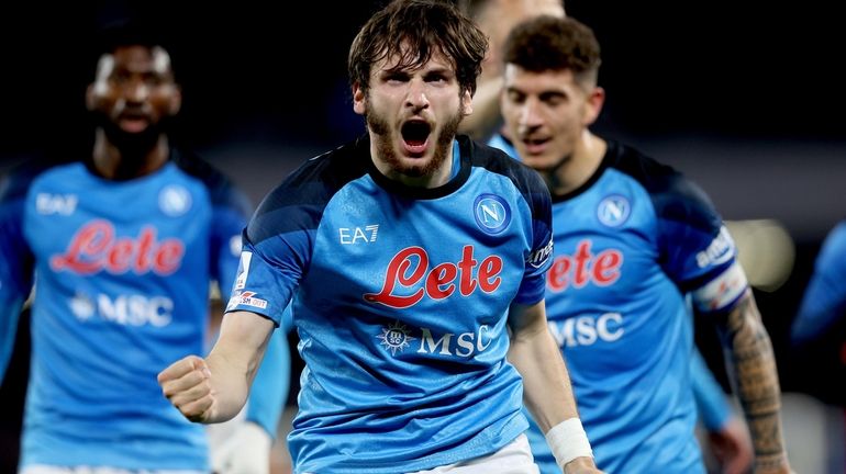 Napoli's Khvicha Kvaratskhelia celebrates scoring during the Serie A soccer...