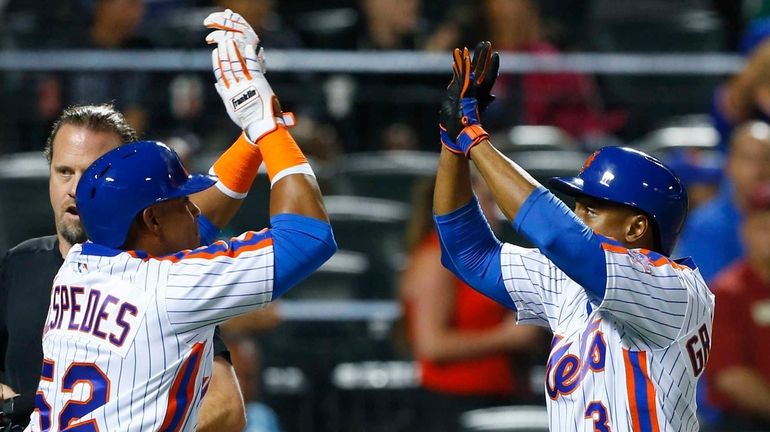 Curtis Granderson #3 of the New York Mets celebrates his...