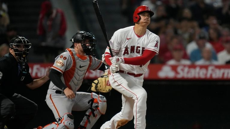 Wilmer Flores hits grand slam, then fouls ball into his face - Newsday