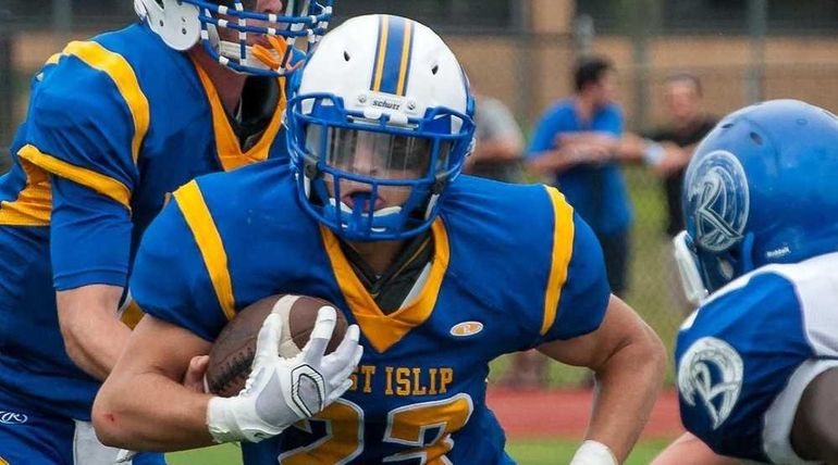 West Islip's Drew Cestaro runs the ball during a game...