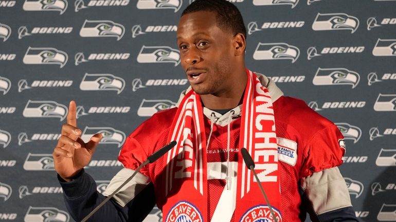 Seattle Seahawks quarterback Geno Smith wears a FC Bayern Munich...