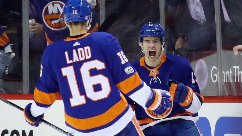 The Islanders' Mathew Barzal celebrates his goal against the Hurricanes...