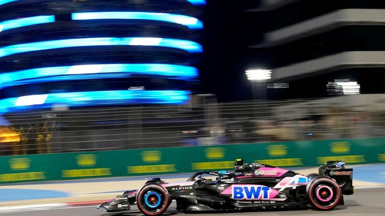 Alpine driver Pierre Gasly of France steers his car during...