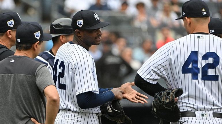 How Yankees bullpen catcher helped Domingo German pitch his