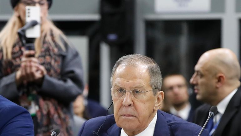 Russia's Foreign Minister Sergey Lavrov, front, attends the plenary session...