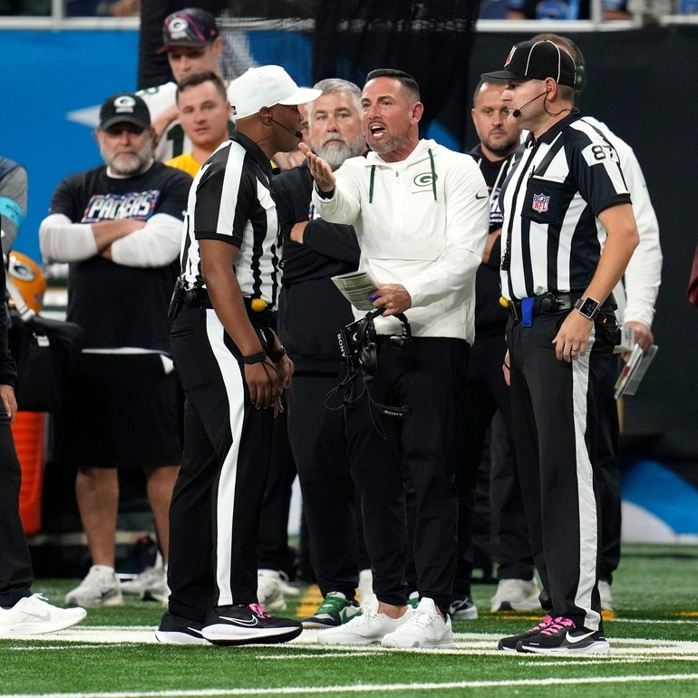 A flag-filled afternoon: Packers-Lions showdown overshadowed by rash of ...
