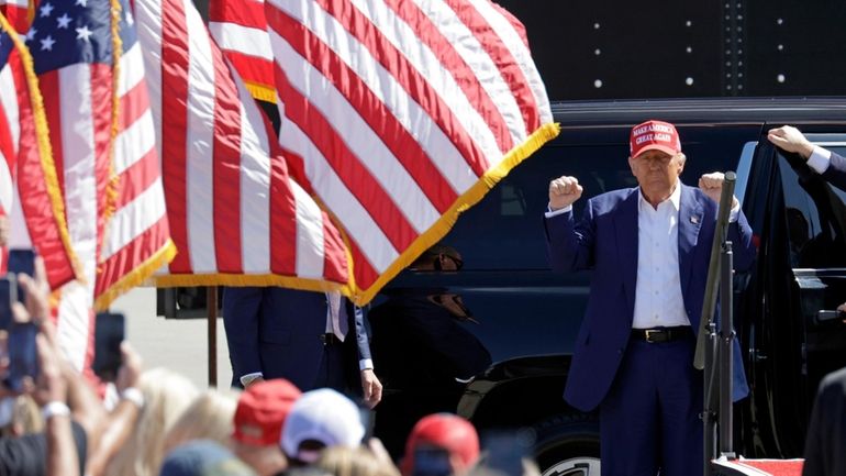 Republican presidential nominee former President Donald Trump arrives at a...