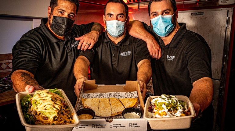 Guac Shop Mexican Grill co-owners Patrick O'Halloran, Sergio DeCiantis and...