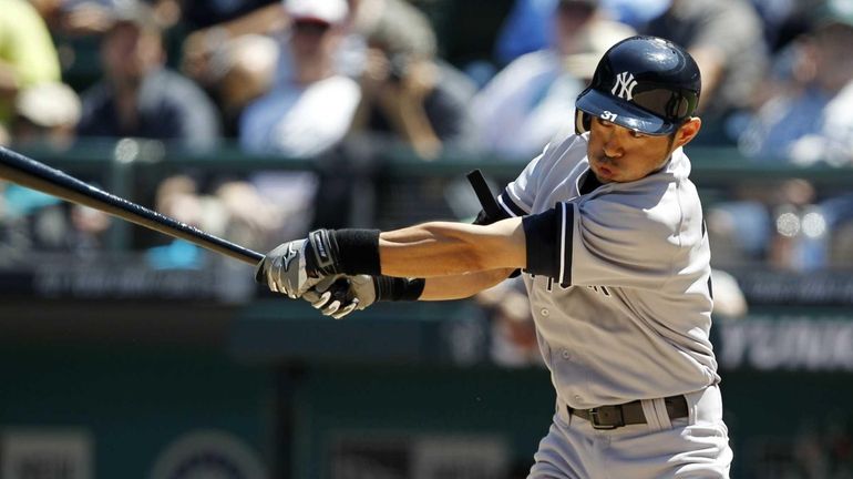 Ichiro Suzuki singles during a game against the Seattle Mariners....