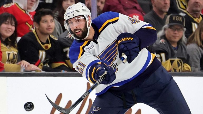 Robert Bortuzzo #41 of the St. Louis Blues passes the...