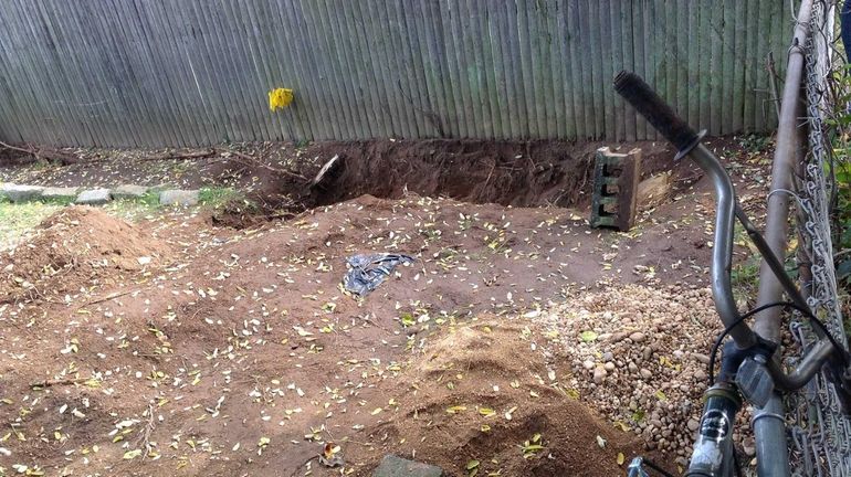 An area in the backyard of a house on Hallock...