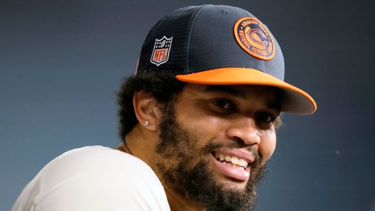 Chicago Bears quarterback Caleb Williams speaks during a news conference...