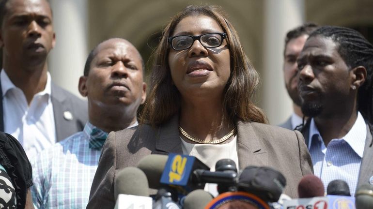 New York City Public Advocate Letitia James, center, joins members...