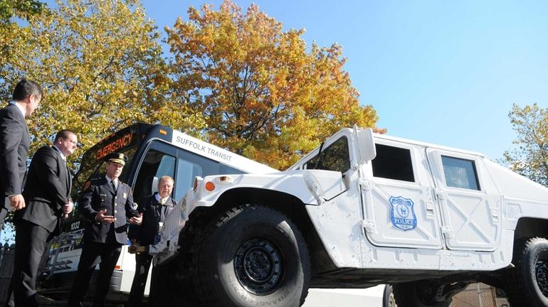 Suffolk County Fire Commissioner Joe Williams, far right, with Suffolk...