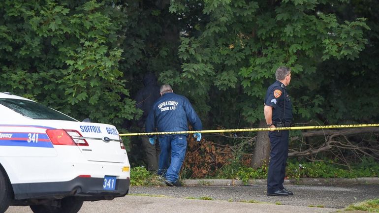 Suffolk police in August 2019 at the scene in Central...