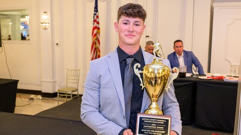 Hunter Colagrande of Kings Park poses with the Yastrzemski Award during...