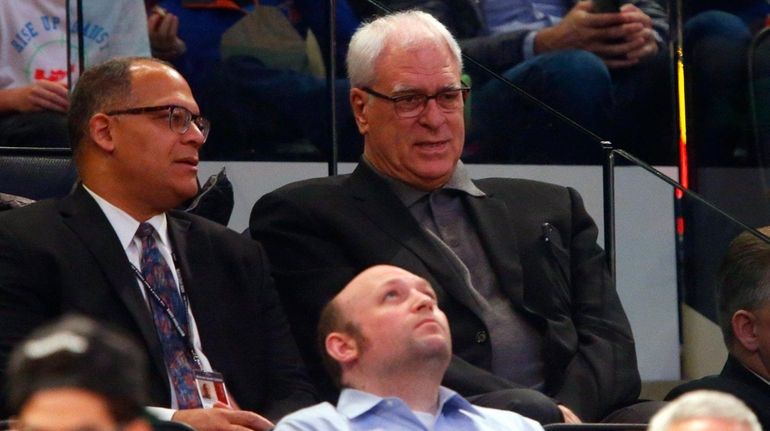 New York Knicks president Phil Jackson watches his team play...