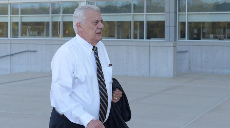 John Venditto, arrives at the federal courthouse in Central Islip...