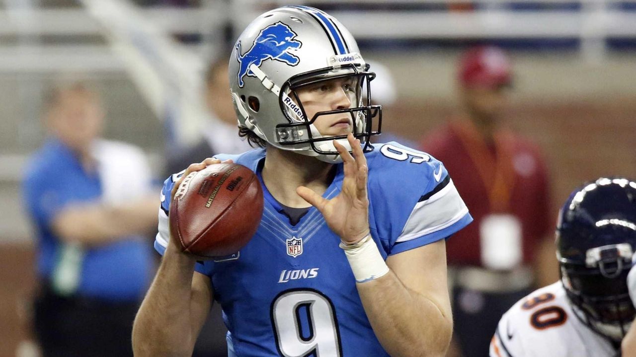 Los Angeles Rams quarterback Matthew Stafford (9) attempts a pass during a  NFL divisional playo …