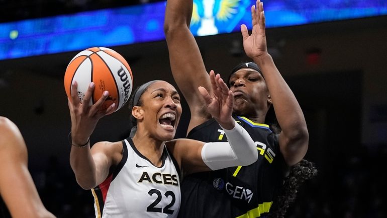 Las Vegas Aces forward A'ja Wilson (22) makes a move...