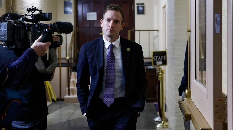 Rep. Max Miller (R-Ohio) leaves for a break during a...