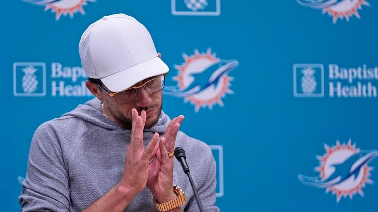 Miami Dolphins head coach Mike McDaniel answers questions during a...