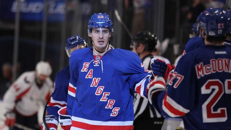 Chris Kreider of the New York Rangers celebrates his third...