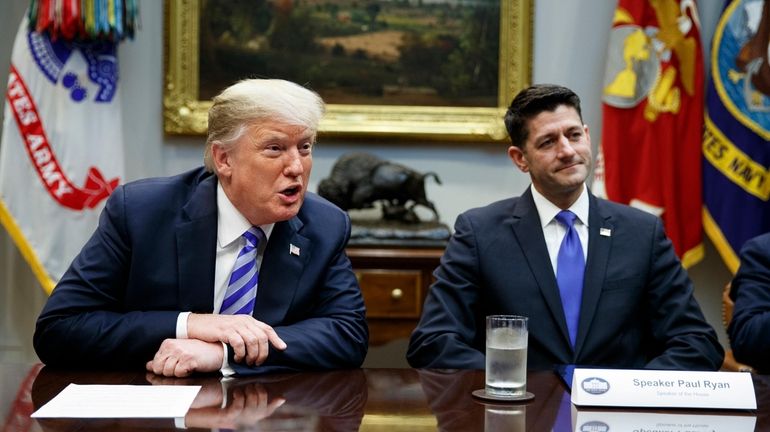 Speaker of the House Rep. Paul Ryan, R-Wis., listens to...