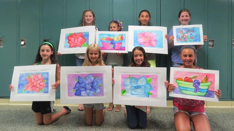 Students from the Massapequa school district show off the watercolor...