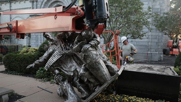 "The Angel of Harmony" sculpture damaged outside the Cathedral Basilica...