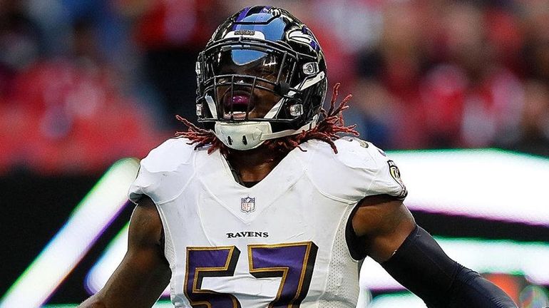 C.J. Mosley reacts after a defensive stop against the Falcons at...