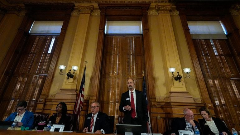 Georgia's State Election Board members discuss proposals for election rule...