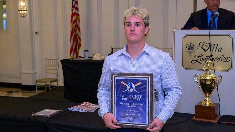 Kevin Schnupp of Comsewogue poses with the Silver Slugger Award during...