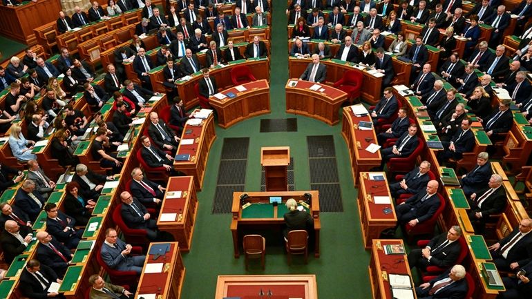 Hungarian Prime Minister Viktor Orban addresses a parliament session, on...