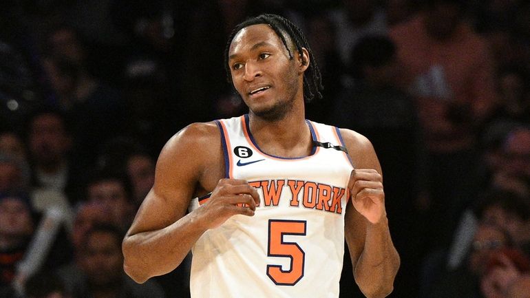 Knicks guard Immanuel Quickley reacts in the first half of...