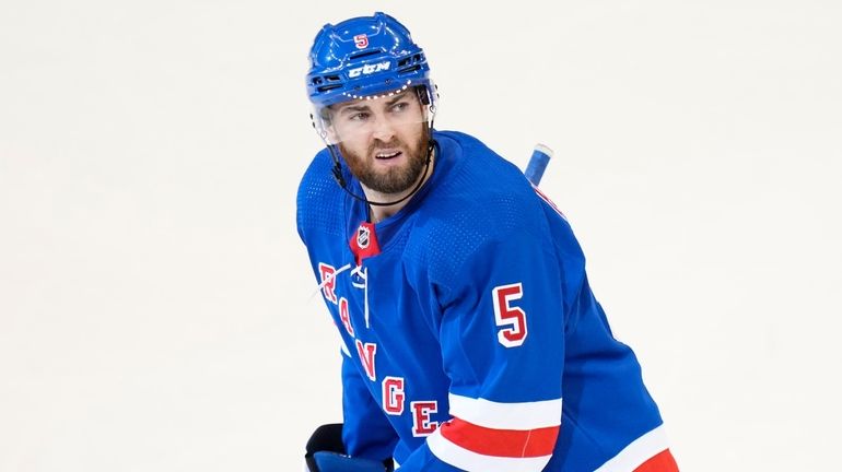 The Rangers' Ben Harpur looks into the stands as he...