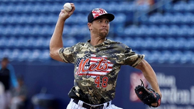 Mets pitcher Jacob deGrom throws on Sunday, July 3, 2022,...