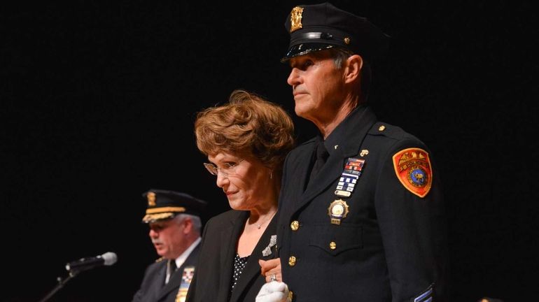 Kathleen Pierri, accepts a Medal of Honor posthumously for Sergeant...