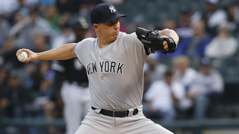 Chad Green of the Yankees pitches in the first inning...