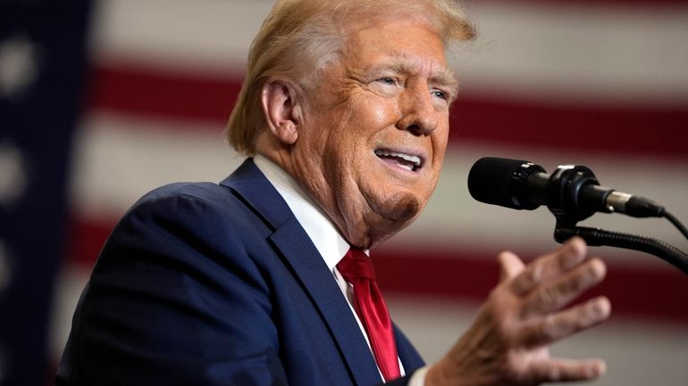 Republican presidential nominee former President Donald Trump speaks during a...