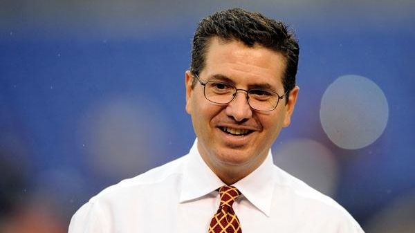 Washington Redskins owner Dan Snyder walks across the field before...