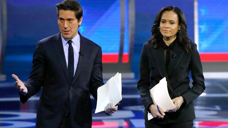 ABC World News Tonight Anchor David Muir, left, addresses members...