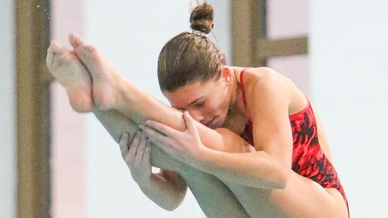 Connetquot’s Kelsey Kruescher during the Suffolk High School girls diving...